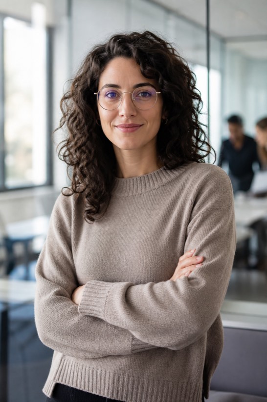 Head of content marketing standing in a modern office